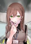  1girl @_@ bangs blush breasts breath brown_hair brown_shirt commentary_request escalator green_eyes hand_up highres large_breasts long_hair mask mask_around_neck mask_pull mouth_mask ol-chan_(oouso) oouso original pink_mask shirt solo surgical_mask sweat sweatdrop 