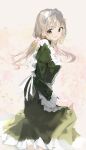  1girl apron bangs black_dress blonde_hair blush dress green_eyes highres iftuoma long_hair long_sleeves looking_at_viewer looking_back maid maid_apron maid_headdress original parted_lips smile solo standing twintails white_apron 