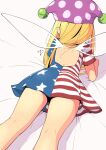  1girl american_flag american_flag_dress back blonde_hair clownpiece dress fairy fairy_wings hat huxiao_(mistlakefront) jester_cap long_hair lying polka_dot solo tagme touhou very_long_hair wings 