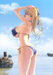  1girl absurdres arms_up ass back bangs bare_shoulders bikini blonde_hair blue_bikini blue_eyes blue_sky breasts cloud covered_nipples from_behind hair_ribbon halterneck high_ponytail highres kaitofuuma large_breasts original outdoors parted_lips ponytail ribbon rock side-tie_bikini sideboob sky solo_focus standing swimsuit water waves 
