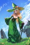  1girl absurdres blonde_hair blush body_markings breasts cleavage corset dress flower gemi_ningen green_corset green_dress hat highres large_breasts long_dress long_hair looking_at_viewer original pointy_ears sharp_teeth smile solo staff teeth witch witch_hat 