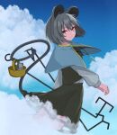  1girl animal_ears bangs basket blue_capelet blue_sky capelet closed_mouth cloud commentary_request crystal dowsing_rod feet_out_of_frame flat_chest flying grey_hair grey_skirt grey_vest hair_between_eyes holding jewelry long_sleeves looking_at_viewer mashiba_lei mouse mouse_ears mouse_girl mouse_tail nazrin orange_eyes pendant shirt short_hair skirt skirt_set sky smile solo tail touhou vest white_shirt 