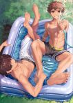  2boys arm_support bangs barefoot black_male_swimwear brown_eyes brown_hair collarbone crossed_legs day feet from_above grass grin hand_up highres holding holding_hose hose looking_at_viewer looking_up lying male_focus male_swimwear multiple_boys navel nayoshi_(r-744) nipples on_back original outdoors parted_lips pectorals reclining short_hair smile soles spiked_hair spraying spread_legs swim_trunks toned toned_male wading_pool water water_drop wet white_male_swimwear 