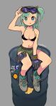  1girl alternate_costume bangs belt bikini bikini_top_only blue_eyes blue_hair breasts bulma capsule_corp commentary_request dragon_ball dragon_ball_(object) drum_(container) full_body gloves gloves_removed highres looking_at_viewer mago short_hair shorts single_glove sitting solo swimsuit tongue tongue_out 