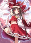  1girl ascot blurry blurry_background blush bow brown_hair closed_mouth detached_sleeves e.o. gohei hair_bow hair_tubes hakurei_reimu highres holding looking_at_viewer medium_hair midriff navel petals red_bow red_eyes red_skirt skirt smile solo torii touhou wide_sleeves yellow_ascot 