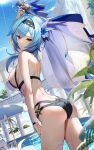  1girl absurdres arm_up ass asymmetrical_hair bare_shoulders beach_chair beach_umbrella bikini blue_hair breasts cape closed_mouth eula_(genshin_impact) flower from_behind from_side genshin_impact hair_flower hair_ornament hairband highres holding holding_cape holding_clothes large_breasts leaning_forward looking_at_viewer looking_back medium_hair pool poolside scottie_(phantom2) solo swimsuit umbrella vision_(genshin_impact) water_drop wet yellow_eyes 