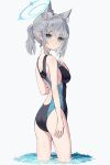  1girl absurdres animal_ear_fluff animal_ears ass bangs bare_arms bare_shoulders black_swimsuit blue_archive blush breasts bright_pupils closed_mouth commentary competition_swimsuit frown grey_hair halo hand_on_own_chest highres looking_at_viewer looking_back medium_breasts mismatched_pupils official_alternate_costume one-piece_swimsuit scarlet23i0 shiroko_(blue_archive) shiroko_(swimsuit)_(blue_archive) short_hair short_ponytail simple_background solo swimsuit wading water white_background wolf_ears 