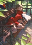  1girl arm_support bangs bare_legs barefoot bench blonde_hair blue_eyes breasts bug butterfly closed_mouth dappled_sunlight dress elf english_commentary expressionless feet hair_between_eyes leaf looking_at_viewer lying medium_breasts on_bench on_side original outdoors pillow pointy_ears red_dress scenery solo sunlight timbougami toes tree trellis wooden_bench 