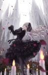  1girl bangs black_dress black_hairband black_pantyhose blurry blurry_background blurry_foreground building candle castle commentary_request day depth_of_field dress falling_petals floating_hair flower frills from_side gothic_lolita hair_ornament hairband highres lolita_fashion long_hair long_sleeves looking_at_viewer missile228 original outdoors pantyhose parted_lips petals purple_eyes red_flower smile solo standing white_hair 