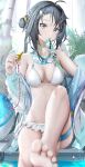  1girl absurdres ahoge arknights bikini black_hair blue_eyes blurry blurry_foreground breasts depth_of_field foot_up hair_bun hair_intakes hair_ornament hairclip highres holding holding_whistle id_card la_pluma_(arknights) la_pluma_(summer_flowers)_(arknights) lanyard looking_at_viewer medium_breasts mouth_hold nopetroto official_alternate_costume sitting soaking_feet soles solo swimsuit thigh_strap whistle white_bikini 