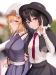  2girls bangs black_capelet black_skirt blonde_hair blurry blurry_background blush bow bowtie breasts brown_eyes brown_hair buttons capelet closed_mouth commentary_request dress feet_out_of_frame fingernails frilled_shirt_collar frilled_sleeves frills fumei_(mugendai) grin hair_ribbon hat hat_bow hat_ribbon highres holding holding_another&#039;s_arm holding_clothes large_breasts looking_at_viewer maribel_hearn mob_cap multiple_girls neck_ribbon necktie purple_dress purple_eyes red_bow red_bowtie red_necktie red_ribbon ribbon shirt sideways_glance skirt smile standing teeth touhou tress_ribbon two-sided_fabric upside-down usami_renko v white_headwear white_ribbon white_shirt 