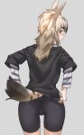  1girl absurdres animal_ears bike_shorts black_shirt blonde_hair brown_eyes commentary extra_ears from_behind grey_background highres kemono_friends layered_sleeves light_brown_hair long_hair long_sleeves looking_back shirt short_over_long_sleeves short_sleeves simple_background solo spotted_hyena_(kemono_friends) striped_sleeves tail tanabe_(fueisei) 