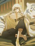  1boy aether_(genshin_impact) alternate_costume bishounen braid ear_covers earrings genshin_impact highres jewelry low_ponytail male_focus senkawaakatsuki single_braid single_earring sitting solo tiger white_tiger 