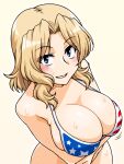  1girl american_flag_bikini bikini blonde_hair blue_eyes blush bouncing_breasts breasts cleavage collarbone flag_print from_above girls_und_panzer kay_(girls_und_panzer) large_breasts long_hair looking_at_viewer looking_up oosaka_kanagawa shiny shiny_hair shiny_skin simple_background smile solo sweat swimsuit upper_body yellow_background 