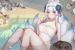  1girl absurdres animal_ears bare_arms bare_shoulders bathing blue_eyes blue_hairband blush breasts character_request cleavage clover_theater commentary commission cup cyanide-whale english_commentary flower fox_ears fox_girl fox_tail hair_ornament hairband hand_up highres kitsune large_breasts looking_at_viewer multiple_tails naked_towel solo tail towel water white_flower white_hair 