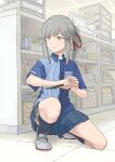  1girl bangs black_socks blue_shirt blue_skirt brown_eyes cash_register closed_mouth commentary_request convenience_store employee_uniform grey_hair hair_ribbon highres holding holding_knife holding_weapon id_card indoors kantai_collection kneehighs knife lawson long_hair official_alternate_costume one_knee pleated_skirt ponytail red_ribbon ribbon shirt shop sidelocks skirt socks solo striped striped_shirt taruya thigh_strap uniform usugumo_(kancolle) weapon 