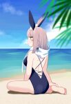  1girl animal_ears beach brown_hair highres jiitarou kaavi looking_at_viewer looking_back mahjong_soul ocean one-piece_swimsuit rabbit_ears rabbit_girl ribbon scarf short_braid short_hair sitting solo swimsuit yellow_eyes 