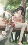  1girl absurdres animal bag bangs bench black_hair blurry blurry_background blush cat collarbone cup handbag highres holding holding_cup long_hair looking_at_another original outdoors pants parted_lips pink_bag pink_eyes pink_shirt sandals shirt short_sleeves sitting smile tngn96 tree twintails umbrella white_pants 