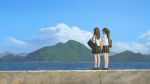  2girls black_skirt blue_sky brown_footwear brown_hair chinese_commentary cloud commentary_request day from_behind highres holding_hands hua_ming_wink loafers long_hair mountain multiple_girls ocean original outdoors scenery school_uniform shirt shoes skirt sky socks standing water white_shirt white_socks wide_shot 