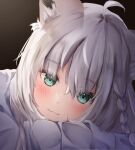  1girl :3 ahoge animal_ear_fluff animal_ears bangs blush braid commentary_request fox_ears fox_girl green_eyes hair_between_eyes head_rest highres hololive looking_at_viewer revision shirakami_fubuki shirt sidelocks single_braid solo uechin_ewokaku virtual_youtuber white_hair white_shirt 