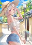  1girl absurdres alternate_costume ass_peek bandeau bare_shoulders blue_shorts blue_sky breasts cloud colored_inner_hair commentary_request cowboy_shot day denim denim_shorts detached_sleeves frilled_bandeau frilled_sleeves frills grey_hair grin hat highres kobassy link!_like!_love_live! looking_at_viewer love_live! micro_shorts midriff multicolored_hair outdoors photo_background pink_eyes red_hair short_hair short_sleeves shorts shoulder_blades sky small_breasts smile solo straw_hat streaked_hair sun_hat virtual_youtuber white_bandeau yugiri_tsuzuri 