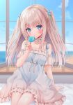  1girl ahoge blue_dress blue_eyes blush brown_hair cloud dress eating female_child food highres indoors long_hair looking_at_viewer nufucha original popsicle sitting sky solo sundress two_side_up window 