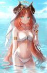  1girl ass_visible_through_thighs bangs bare_shoulders bikini blue_eyes blush bracelet breasts forehead_jewel genshin_impact groin highres horns jewelry long_hair looking_at_viewer medium_breasts midriff nasii navel nilou_(genshin_impact) ocean parted_bangs parted_lips red_hair revision sky solo stomach swimsuit thigh_strap veil very_long_hair wading wet 