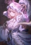  1girl blue_dress blue_hat blue_sash bruchiou cowboy_shot dress folding_fan frilled_dress frills ghost glowing hand_fan hat highres holding holding_fan long_hair long_sleeves mob_cap pink_eyes pink_hair purple_background saigyouji_yuyuko sash smile solo sparks touhou triangular_headpiece veil white_veil 