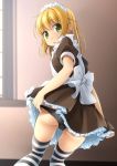  1girl :o apron ass bangs black_panties blonde_hair blurry blurry_background blush bow brown_dress commentary_request depth_of_field dress eyebrows_visible_through_hair fang frilled_apron frilled_dress frills green_eyes hair_between_eyes highres kneeling long_hair looking_at_viewer looking_back maid maid_apron maid_headdress open_mouth original panties panty_pull pulled_by_self shibacha solo striped striped_legwear thighhighs underwear white_apron white_bow 