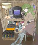  1girl absurdres amputee brown_skirt brown_sweater cabinet calculator chair clock commentary crt double_amputee game_console green_eyes green_hair highres holding holding_phone lamp long_hair long_skirt looking_at_viewer open_mouth original phone ponytail prosthesis prosthetic_leg sega_mega_drive sidelocks sitting sk76376502 skirt solo sweater symbol-only_commentary typewriter 