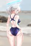  1girl animal_ears ass ass_grab back_cutout beach blue_archive blurry blurry_background blush breasts clothing_cutout earrings extra_ears from_behind grabbing_own_ass grey_hair halo highres jewelry looking_at_viewer looking_back medium_breasts mongsil one-piece_swimsuit outdoors ponytail shiroko_(blue_archive) shiroko_(swimsuit)_(blue_archive) skindentation smile stud_earrings sweatdrop swimsuit wolf_ears 