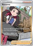  1girl aerodactyl aoki_toshinao artist_name bastiodon blush book bookshelf brown_hair card_(medium) character_name company_name copyright_name copyright_notice dress english_text eyelashes grey_dress hair_ribbon holding holding_pen indoors long_hair official_art pantyhose pen pokemon pokemon_card pokemon_oras pokemon_tcg red_eyes red_pantyhose red_ribbon ribbon roxanne_(pokemon) short_sleeves skeleton solo standing third-party_source trading_card twintails tyrantrum window 