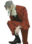  1boy ace_attorney adjusting_footwear ascot black_boots black_vest boots closed_eyes curtained_hair foot_out_of_frame grey_hair highres jacket layered_sleeves leg_up long_sleeves male_focus miles_edgeworth open_clothes open_jacket pants paper_in_mouth red_jacket red_pants red_suit shirt short_hair simple_background solo sotenborii standing standing_on_one_leg suit suit_jacket vest white_ascot white_background white_shirt 