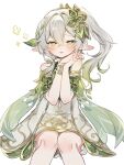  1girl bare_shoulders bracelet commentary_request dress genshin_impact gold_trim green_eyes green_hair hair_between_eyes hair_ornament hands_up highres interlocked_fingers jewelry leaf_hair_ornament looking_at_viewer medium_hair nahida_(genshin_impact) one_side_up open_mouth own_hands_together petite pointy_ears simple_background sitting smile solo sorani_(kaeru0768) white_background white_dress white_hair 