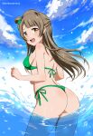  1girl absurdres angel_gabriel. ass bikini blue_sky bow breasts brown_eyes brown_hair cloud day from_behind green_bikini hair_bow highres long_hair looking_at_viewer looking_back love_live! love_live!_school_idol_project medium_breasts minami_kotori ocean one_side_up outdoors shiny shiny_hair shiny_skin side-tie_bikini_bottom sky solo standing swimsuit water 