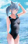  1girl absurdres alinfaeleas animal_ear_fluff animal_ears bangs black_one-piece_swimsuit blue_archive blue_eyes blue_sky breasts cloud competition_swimsuit covered_navel cowboy_shot cross_hair_ornament day extra_ears grey_hair hair_ornament halo highres horizon low_ponytail medium_hair mismatched_pupils multicolored_clothes multicolored_swimsuit one-piece_swimsuit outdoors shiroko_(blue_archive) shiroko_(swimsuit)_(blue_archive) sky small_breasts solo standing swimsuit water 