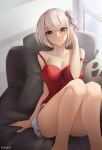  1girl absurdres bare_legs bare_shoulders bird blonde_hair bob_cut breasts camisole cleavage closed_mouth collarbone couch cushion hair_ribbon hand_in_own_hair hand_up highres knees_up large_breasts looking_at_viewer lycoris_recoil nishikigi_chisato on_couch one_side_up owl red_camisole red_eyes red_ribbon ribbon schwix short_hair short_shorts shorts sitting solo spaghetti_strap strap_slip thighs white_shorts window 