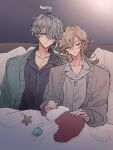  2boys ahoge alhaitham_(genshin_impact) blanket christmas_ornaments christmas_stocking closed_eyes closed_mouth commentary_request genshin_impact green_eyes hand_on_another's_shoulder highres kaveh_(genshin_impact) kottttu_gs long_sleeves looking_at_another messy_hair multiple_boys open_mouth pillow 