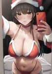 1girl :o bare_shoulders bell bikini black_hair blush bra breasts brown_eyes cellphone choker christmas cleavage closed_mouth commentary_request curvy ear_piercing hat highres holding holding_phone indoors konata_(kankin_jk) large_breasts long_hair long_sleeves looking_at_viewer mishiranu_joshikousei_ni_kankin_sareta_mangaka_no_hanashi mole mole_on_neck nail_polish navel panties phone piercing red_bra red_choker red_nails red_panties ryouma_(galley) santa_bikini santa_costume santa_hat selfie smartphone smile solo swimsuit underwear 