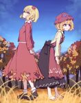  2girls absurdres aki_minoriko aki_shizuha apron autumn barefoot black_skirt blonde_hair closed_mouth food food-themed_hair_ornament fruit fruit_hat_ornament grape_hat_ornament grapes hair_ornament hat hat_ornament highres kame_(kamepan44231) leaf_hair_ornament long_sleeves mob_cap multiple_girls red_apron red_eyes red_headwear red_shirt red_skirt shirt short_hair siblings sisters skirt smile touhou yellow_eyes yellow_shirt 