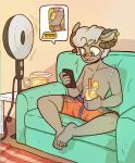  anthro beverage blush bodily_fluids bovid caprine clothed clothing ear_piercing ear_ring flirting furniture girly heat_(temperature) hi_res horn ice looking_at_object looking_at_phone male mammal on_sofa phone piercing ring_piercing rotary_fan sending_nudes sitting sitting_on_sofa sofa solo sweat texting trgreta underwear underwear_only 
