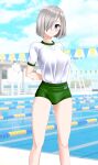  1girl absurdres alternate_costume arms_behind_back blue_eyes blue_sky breasts buruma cloud commentary_request day feet_out_of_frame green_buruma grey_hair gym_shirt gym_uniform hair_ornament hair_over_one_eye hairclip hamakaze_(kancolle) highres kantai_collection lane_line large_breasts looking_at_viewer outdoors parted_lips pool shirt short_hair sky solo string_of_flags t-shirt takafumi white_shirt 