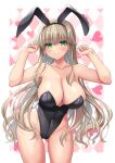  1girl animal_ears ass_visible_through_thighs black_leotard blonde_hair breasts cleavage commentary_request cowboy_shot green_eyes large_breasts leaning_forward leotard looking_at_viewer minase_(dragon_panda) original playboy_bunny rabbit_ears rabbit_tail solo standing strapless strapless_leotard tail 