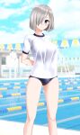  1girl absurdres alternate_costume arms_behind_back blue_eyes blue_one-piece_swimsuit blue_sky breasts cloud commentary_request competition_school_swimsuit day feet_out_of_frame grey_hair gym_shirt hair_ornament hair_over_one_eye hairclip hamakaze_(kancolle) highres kantai_collection lane_line large_breasts looking_at_viewer outdoors parted_lips pool school_swimsuit shirt short_hair sky solo string_of_flags swimsuit swimsuit_under_clothes t-shirt takafumi white_shirt 