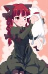  1girl akihikohex animal animal_ears bow braid cat cat_ears cat_tail dress extra_ears green_dress hair_bow holding holding_animal holding_cat kaenbyou_rin looking_at_animal multiple_tails red_eyes red_hair smile solo tail touhou twin_braids 