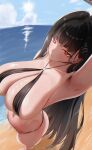  1girl absurdres arm_up armpits barefoot beach bikini black_bikini black_hair blue_archive blue_sky blush breasts cleavage day ejikusen hair_ornament hairclip halo highres large_breasts long_hair looking_at_viewer navel ocean outdoors red_eyes ringed_eyes rio_(blue_archive) skindentation sky solo swimsuit 