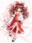  bed_sheet bobby_socks bow brown_eyes brown_hair daisy detached_sleeves flower from_above hair_bow hakurei_reimu long_hair looking_at_viewer looking_up lying mary_janes on_back shoes socks solo staring touhou tucana 