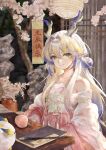  1girl absurdres arknights bare_shoulders blonde_hair blue_hair book calligraphy_brush chinese_clothes chinese_commentary closed_mouth commentary_request dragon_bean_(arknights) dragon_girl dragon_horns earrings eastern_dragon_horns flower food fruit hair_between_eyes hair_flower hair_ornament hanfu highres hoop_earrings horns jewelry lantern long_hair looking_at_viewer multicolored_hair necklace nenju paintbrush paper_lantern peach peach_blossom pearl_necklace pink_hanfu pointy_ears shawl shu_(arknights) sitting smile solo streaked_hair table tree white_hair white_hanfu white_shawl xhs_cheng. 