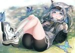  1girl animal_ear_fluff animal_ears ass bike_shorts black_shorts blue_eyes book bug butterfly cat_ears character_request ear_tag goddess_of_victory:_nikke grey_hair grey_jacket highres jacket kneehighs knees_up legs long_hair loose_kneehigh lying on_back open_mouth outdoors pen rpg_(ram) shoes shorts socks solo thighs twintails visor_cap white_footwear white_socks 