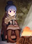  1girl bangs black_gloves blue_hair blurry blurry_background boots brown_footwear brown_skirt campfire closed_mouth commentary fingerless_gloves fire gloves hair_between_eyes hair_bun highres holding hood hood_down kamille_(vcx68) knees_up light_smile log long_skirt long_sleeves looking_to_the_side shima_rin shiny shiny_hair single_hair_bun sitting skirt solo steam winter_clothes yurucamp 